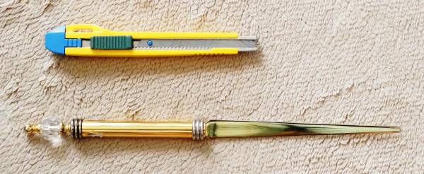 Cutter knife and paper knife