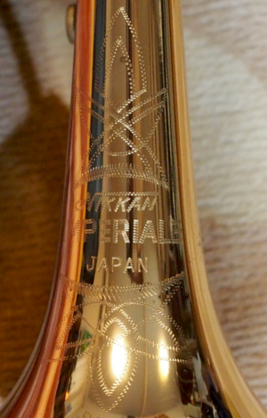 Mark of NIKKAN (Bell position)